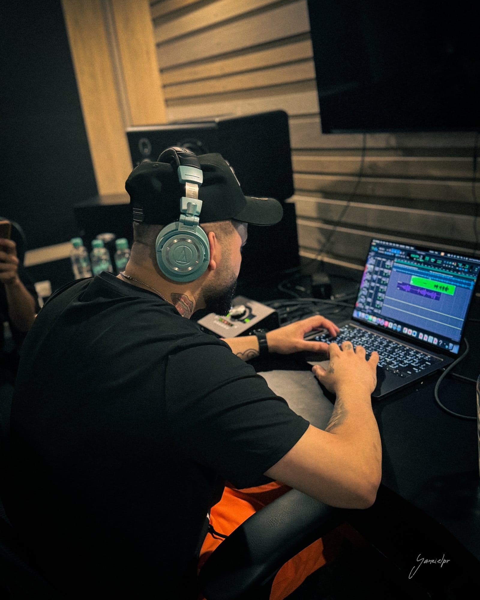 Engineer tracking vocals in the studio